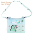 Light blue waterproof phone pouch featuring a cute dinosaur print and adjustable strap - Green Dinosaur