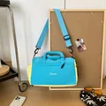 Blaue und gelbe farblich abgesetzte Reisetasche für Yoga und Fitness mit Schultergurt - Blau