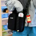 Multifunctional black outdoor crossbody bag with dedicated water bottle holder and charm - Standard Style / Black