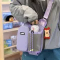 Lavender outdoor sports crossbody bag featuring water bottle holder and cute apple charm - Standard Style / Purple