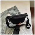 Stylish minimalist black nylon waist bag for women featuring street style design - Black