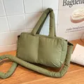 Olive green puffer quilted tote bag with long padded shoulder strap and top handles - Dark Green