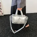 Metallic silver quilted puffer tote bag with top handle and shoulder strap - Silver