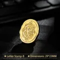 Vintage gold metal wax seal stamp head with ornate letter E engraving - Letter B