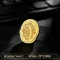 Premium vintage gold metal wax seal stamp head featuring an ornate letter C engraving - Letter C