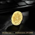 Vintage gold metal wax seal stamp head featuring a decorative letter L design for DIY crafts - Letter L