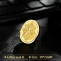 Vintage golden oval metal sealing wax stamp head with engraved letter N and floral pattern - Letter N