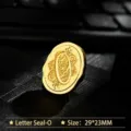 Retro vintage metal wax seal stamp head featuring stylized letter O in elegant golden finish - Letter O