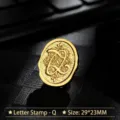 Retro metal wax seal stamp head with ornate letter Q golden finish - Letter Q