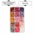 15-compartment storage box filled with octagonal sealing wax beads in various pink shades - Bright Pink