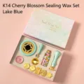 Cherry blossom wax seal stamp kit in lake blue with furnace, spoon, and colorful wax beads. - K14 Sakura Wax Seal Kit / Lake Blue
