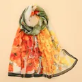 Detailed view of floral print Georgette scarf with vibrant orange and yellow blooms - Multicolor Flower Print Style (XQ487-1)
