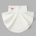Detail view of the white dickey collar featuring a rhinestone heart and angel design - Tops / White