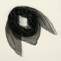 Detailed macro view of sheer black polyester square scarf with sparkling rhinestone waves - 80x80cm / Black