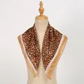 Elegant leopard print chiffon square scarf for women displayed on a classic mannequin - 65*65cm / Khaki