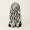 Detailed view of a white satin square scarf with a black Keffiyeh-style plaid pattern - Grey / 91x91cm