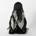 Back view of a silk headscarf featuring polka dots and paisley patterns on long hair - 90*90cm / FH192-01 - Black