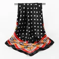 Silk feel satin square scarf featuring black polka dots and vibrant geometric border. - Black / 90x90cm