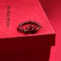 Elegant cinnabar and garnet bead ring featuring a hand-carved Pixiu mythical creature - Pixiu Style / Copper Fittings / Burgundy