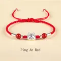 Handgefertigtes rotes geflochtenes Armband mit S999 Silber Babydrachen-Anhänger - 平安红(平安红S925银龙宝宝红玛瑙编织手链)