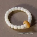 Pulsera artesanal de raíz de Bodhi de jade blanco con una cuenta decorativa naranja - Estilo Sencillo (8X10)