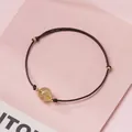 Handmade minimalist woven cord bracelet with a single crystal bead and gold accents. - Gold Rutilated Quartz - Brown Rope