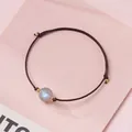 Minimalist handmade brown braided rope bracelet with iridescent crystal bead and gold accents - Rainbow Moonstone - Brown Rope