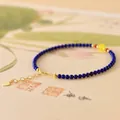 Elegant lapis lazuli and nan hong agate beaded bracelet with a gold heart charm - 14cm + Tail Chain Style / Lapis Lazuli Bracelet