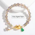 Handcrafted Neo-Chinese grey agate beaded bracelet featuring a golden dragon charm - Grey Agate / 8mm (27 Beads) / Gray