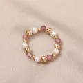 Elastic ring featuring natural freshwater pearls and pink strawberry quartz beads. - Freshwater Pearl (Strawberry Quartz)