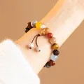 Traditional 18-seed Buddhist prayer bead bracelet in New Chinese style on wrist - Multi-gemstone Bracelet