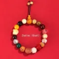 Handcrafted 18-bead Buddhist bracelet with zodiac sheep charm detail - Zodiac Sheep
