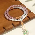 Zweistrangiges Perlenarmband mit rosa Katzenaugen und weißem Jade-Donut-Anhänger - Rosa und Weißes Katzenauge