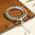 Pulsera de doble capa hecha a mano con piedras de ojo de gato y cuentas de sándalo - Calcedonia Azul Alashan Semilla de Bodhi
