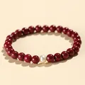 Elegant red cinnabar bead bracelet with a single natural freshwater pearl charm - 6mm Bead Diameter / 6mm Purple Cinnabar With White Pearl