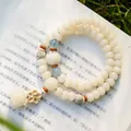 Natural white Bodhi root 108 beads mala bracelet featuring elegant lotus charms - 108 Beads Lotus Style / Approx. 7 mm / Cream