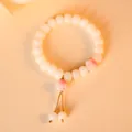 Natural Bodhi root bracelet with cute pink cat paw charms in white jade-like finish. - Cherry Pink Cat Paw with Tassel / 1 Piece / Sakura Pink