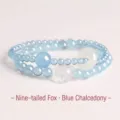 Double-loop aquamarine beaded bracelet with nine-tailed fox and peace buckle charms - Nine-Tailed Fox Blue Chalcedony Bracelet