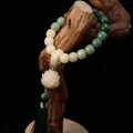 Handmade natural Bodhi root bead bracelet featuring a lotus flower charm and green tassel - Gradient Color Hand-Held Style / 10x11 / Gradient Green