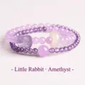 Amethyst beaded bracelet featuring a carved rabbit charm and Ping An Kou bead - Cute Rabbit Amethyst Safety Button Bracelet