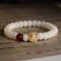 Elegant white bodhi root bracelet featuring a cute cat paw charm and red bead accent - Charred / 8x10 / White
