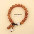 Natural yellow Bodhi root bracelet with 7mm beads and white accent lotus bead. - Yellow Bodhi / 7mm / Tan