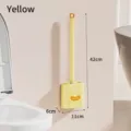 Yellow wall-mounted silicone toilet brush with compact storage base and 42cm handle. - Yellow