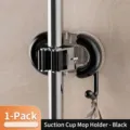 Black wall-mounted vacuum suction cup mop and broom organizer for bathroom storage - Black