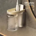 Wall-mounted cream white toothbrush holder and mouthwash cup set for modern bathroom - Off White