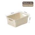 Medium sized cream yellow plastic mesh storage basket with handles, size 25x17x10cm - M / Creamy Yellow
