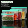Reusable green EVA food storage bags in four different sizes for kitchen organization - S / Green