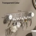 Transparent wall rack with 10 hooks and creative vacuum suction cups for bathroom - Clear