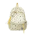 Cream-colored canvas backpack with all-over black star prints and yellow decorative pulls - One Size / Yellow