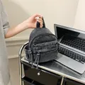 Mini washed black denim backpack for women with long zipper tassels and pockets - Black